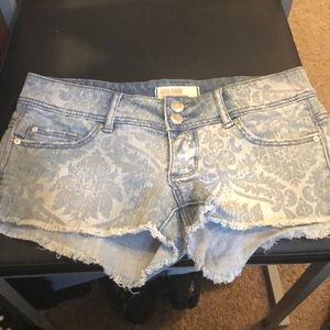 Denim shorts. Never worn. Size 0